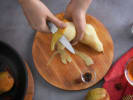 Cooking Class - French Fall Gourmet in Downtown Dallas: Peeling pears over wooden board
