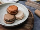 Cooking Class - French Macaron Workshop in Northern Suburbs: A wooden plate showcasing macarons in neutral tones