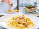 Cooking Class - Italian Favorites: Pasta and Beyond in Northern Suburbs: Collage of fettuccine carbonara, pasta rolling, polenta cake, and dark chocolate tiramisu.