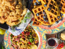 Cooking Class - Southern Brunch: Waffles, Chicken & Cocktails: Brunch menu spread featuring crunchy buttermilk chicken, waffles with blueberries and Marinated Bean Salad