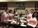 Food Tour - North Beach Neighborhood Cuisine: Cecilia Philips. North Beach Tour. Guests with Bibs on Eating Cioppino