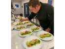 Private Chef - Modern American Fusion: Chef adding dressing to plated salads