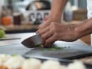 Couples Cooking Class - Classic Persian Cuisine: Chef chopping chives