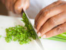 Online Cooking Class - Gourmet Charcuterie Board in Downtown Toronto: Chef chopping spring onions