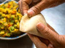Cooking Class - Traditional Indian Spread: Chef folding samosas