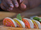 Cooking Class - From Scratch Pasta Delights: Chef plating Caprese salad