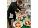 Private Chef - Gourmet Coastal Cuisine: Chef plating tomato and Burrata salad