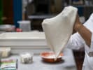 Cooking Class - Personalized Pizza At Home: Chef shaping pizza dough