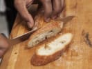 Team Building Cooking Class - Handpicked Italian Favorites in The Bronx: Chef slicing French baguette