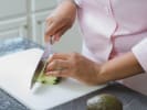 Couples Cooking Class - Upscale Persian Favorites: Chef slicing cucumbers