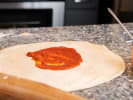 Online Pizza Making Class - Pizza Making: pizza sauce on pizza dough