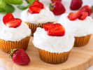 Cooking Class - Cupcake Celebration - Family Fun in Northern Suburbs: Cupcakes with whipped cream and strawberries served on a wooden platter