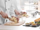Team Building Cooking Class - Collaborative Mediterranean Fare in Denver: Cutting bananas