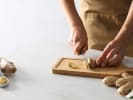 Cooking Class - Fundamental Thai Dishes: Cutting galangal