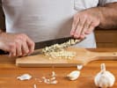 Cooking Class - Italy's Finest Flavors in Northern Suburbs: Cutting garlic