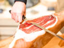 Team Building Cooking Class - Honing Charcuterie Skills: Cutting prosciutto