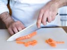 Cooking Class - Amazing Omakase Sushi in Minneapolis: Cutting salmon