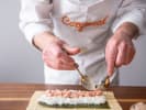 Cooking Class - Sushi Rolling and Matcha Mousse Making in Toronto: Cutting tuna