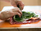 Cooking Class - In Home Dinner Party: Flanksteak being stuffed and rolled