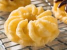 Cooking Class - Fried and Fabulous Donuts in Downtown Dallas: French cruller donut on a cooling rack