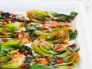Cooking Class - Handmade Dim Sum Cooking - Date Night in Dallas: Garlic steamed bok choy halves with red chili and sesame on a white platter