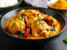 Cooking Class - The South Indian Spread From Scratch in Northern Suburbs: Kerala Chicken Curry in a black bowl