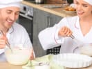 Team Building Cooking Class - Hands-On Spanish Cooking For Team in Salt Lake City: Mixing cake batter together