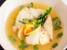Cooking Class - Classic French Table in Manhattan: Pan Roasted Cod with Tarragon-Citrus Butter in a white plate