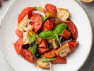 Cooking Class - Seasonal Summer Pasta in Northern Suburbs: Panzanella salad with tomatoes and basil – A bowl of rustic panzanella salad made with chunks of tomato, torn bread, fresh basil, and olive oil.
