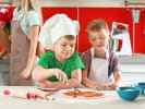 Cooking Class - Homemade Pizza Night - Family Fun in Northern Suburbs: Putting tomato pizza sauce with family