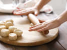 Team Building Cooking Class - Spicy Indian Culinary Adventure in Houston: Rolling flatbread
