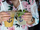 Food Tour + Drink Upgrade - Vibrant Culture of South Beach Miami in Miami: person holding a mojito