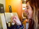 Weekend Food Tour - The Best Eats in the Mission District in San Francisco: SFT san francisco  person sampling chocolate on a food tour