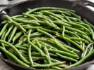 Cooking Class - Campfire Cooking in Northern Virginia: SautÃ©ed Green Beans being cooked in cast iron