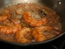 Couples Cooking Class - Shrimp & Grits Cupcakes for 2: Shrimp cooking in a pan