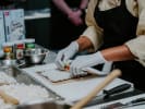 Cooking Class - Japanese Sushi Delight in Boston in Boston Proper: a woman making sushi in cooking class