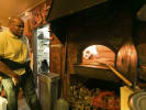 Food Tour - North Beach Neighborhood Cuisine: Tour guest looking in Tommaso s oven 101 7866 BC 0224 copy (4)