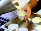 Cooking Class - Flavors of the Tuscan Countryside in Northern Virginia: Tuscan pouring panna cotta