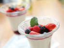 Cooking Class - Cozy Northern Italian Dinner - Date Night in Boulder: Vanilla panna cotta in a glass topped with fresh mixed berries and a mint leaf