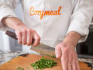 Cooking Class - Favorite Spring Dishes in Manhattan: a chef is cutting herbs on a cutting board