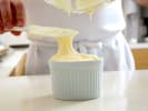 Cooking Class - Emily in Paris-Inspired Gourmet Dinner in Buckhead: a chef making cheese souffle