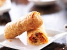 Team Building Cooking Class - Bonding With Dumplings and Egg Rolls in Houston: a plate with egg roll