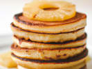 Online Cooking Class - Pancakes Two Ways Pajama Brunch: a stack of pineapple pancakes