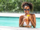 Private Chef - Poolside Cocktail Service: a woman drinking a cocktail in a pool