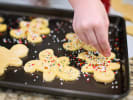 Cooking Class - Winter Baking - Kids' 5-Day Bake-Off in Downtown Dallas: adding sprinkles to cookies