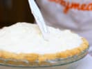Cooking Class - Pies Galore: adding whipped cream to lemon ice box pie