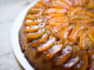 Cooking Class - Garden-Fresh Spring Cuisine in Downtown Dallas: an orange upside down cake on a white plate