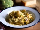 Cooking Class - Trattoria-Style Cooking - Date Night in Northern Virginia: plated artichoke fettuccine pasta served on rustic wooden table