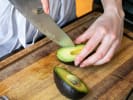 Team Building Cooking Class - Mexican Street Taco Challenge for Groups in DC: avocado cutting
