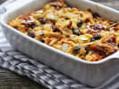 Team Building Cooking Class - Louisiana's Cajun Showcase for Groups in Downtown Dallas: baking bread pudding in a tray